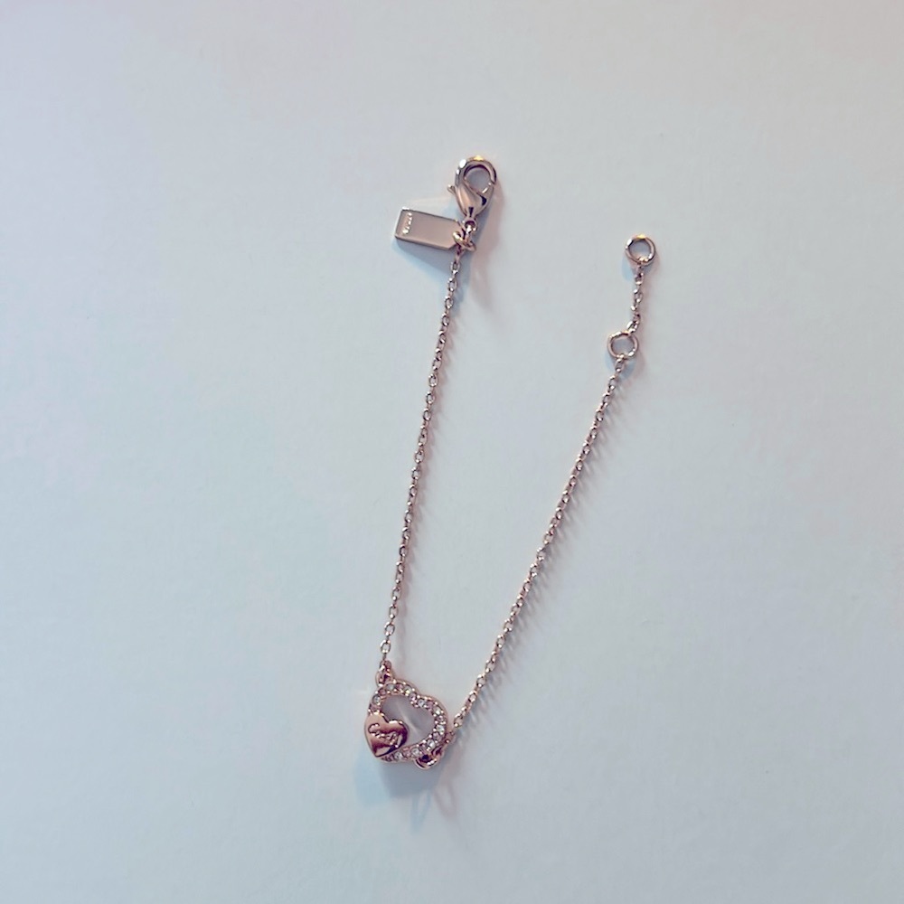 Coach Pave Heart 7” rose gold-tone bracelet